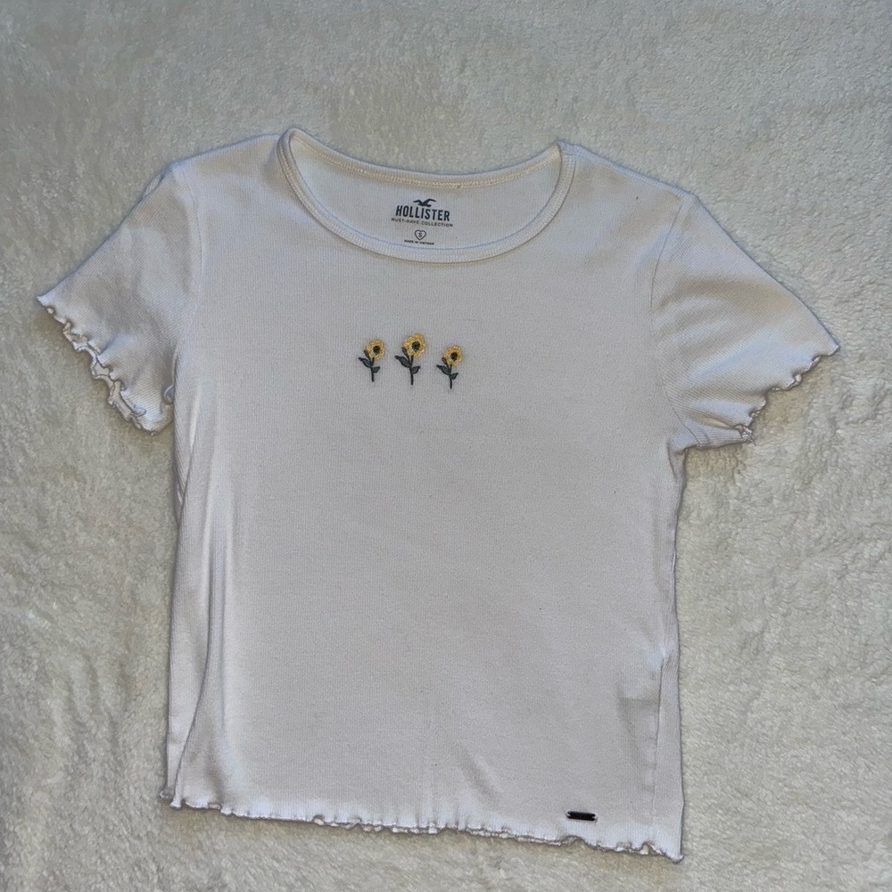 White Baby Tee With Ruffles and Flower Embroidery